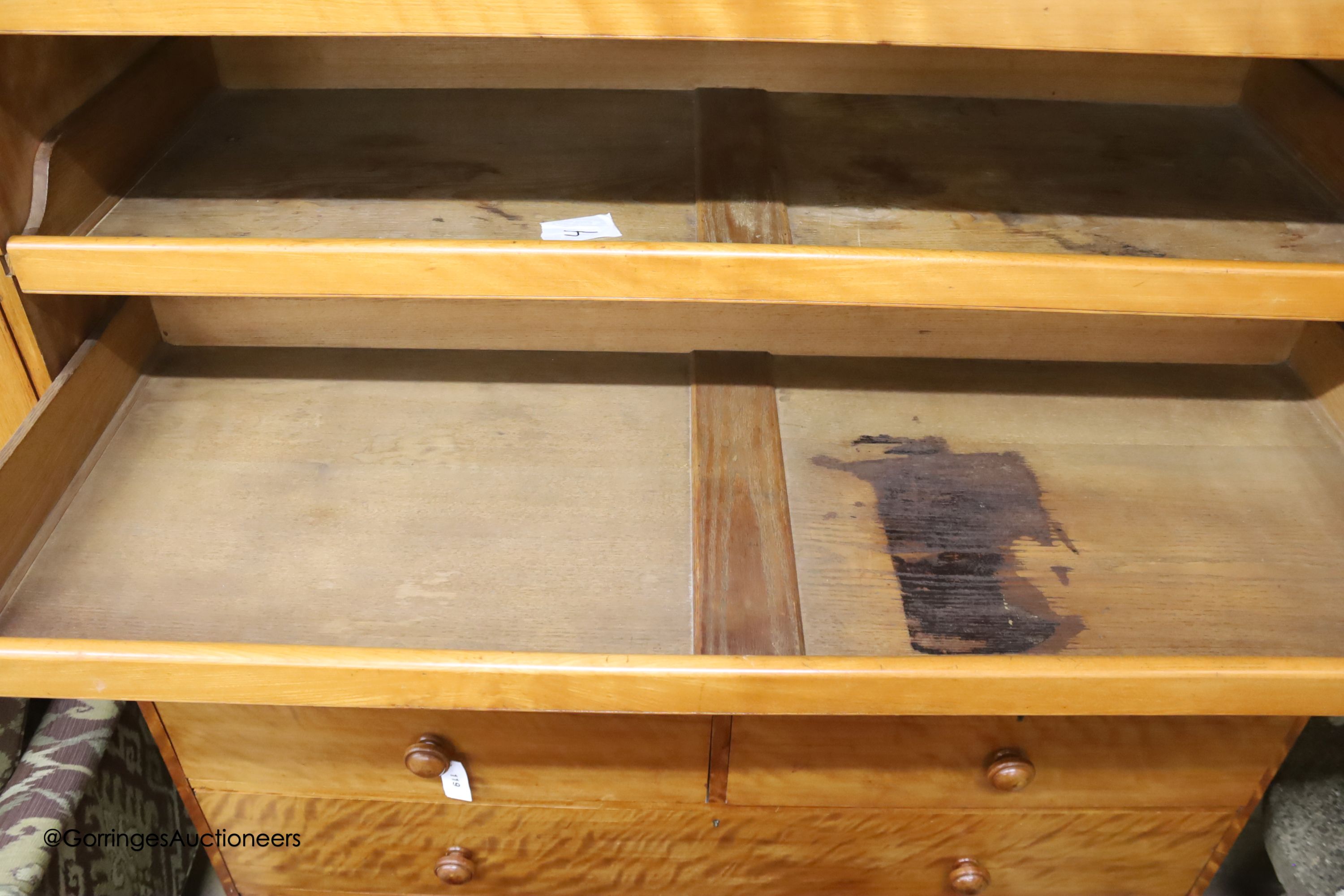 A Victorian satin birch linen press, width 137cm depth 57cm height 214cm
